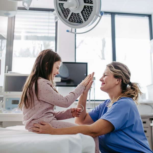 Clinician sharing a moment with a young patient